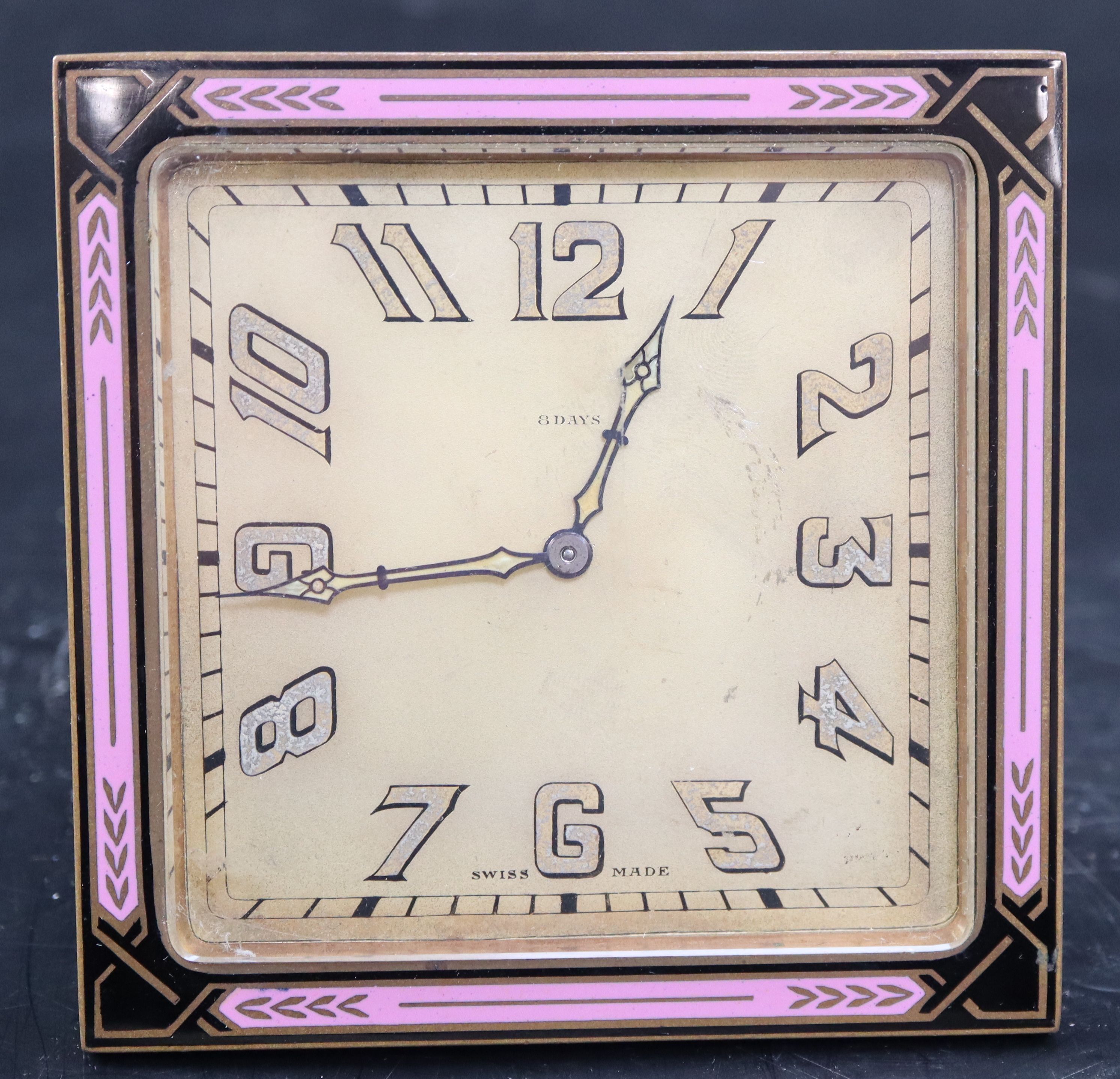 A mid 20th century Swiss enamelled brass eight day travelling timepiece, 10.5cm